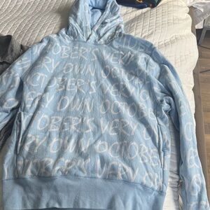 OVO Light Blue Hoodie with White Text